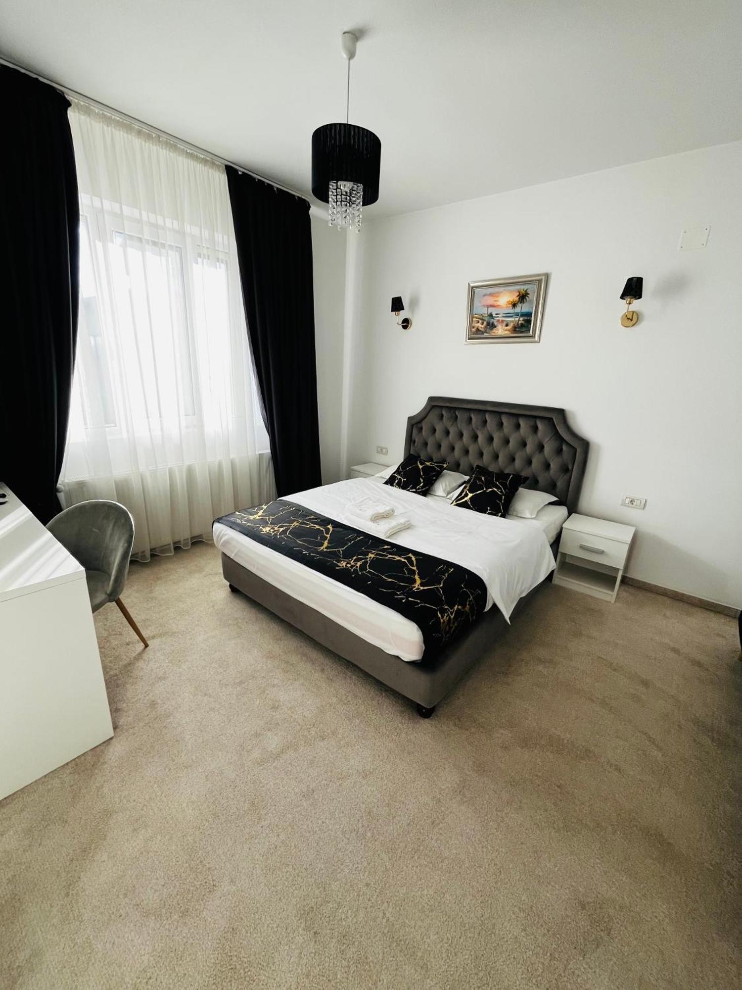 Cochet Boutique Hotel ทาร์กู จิอู ภายนอก รูปภาพ
